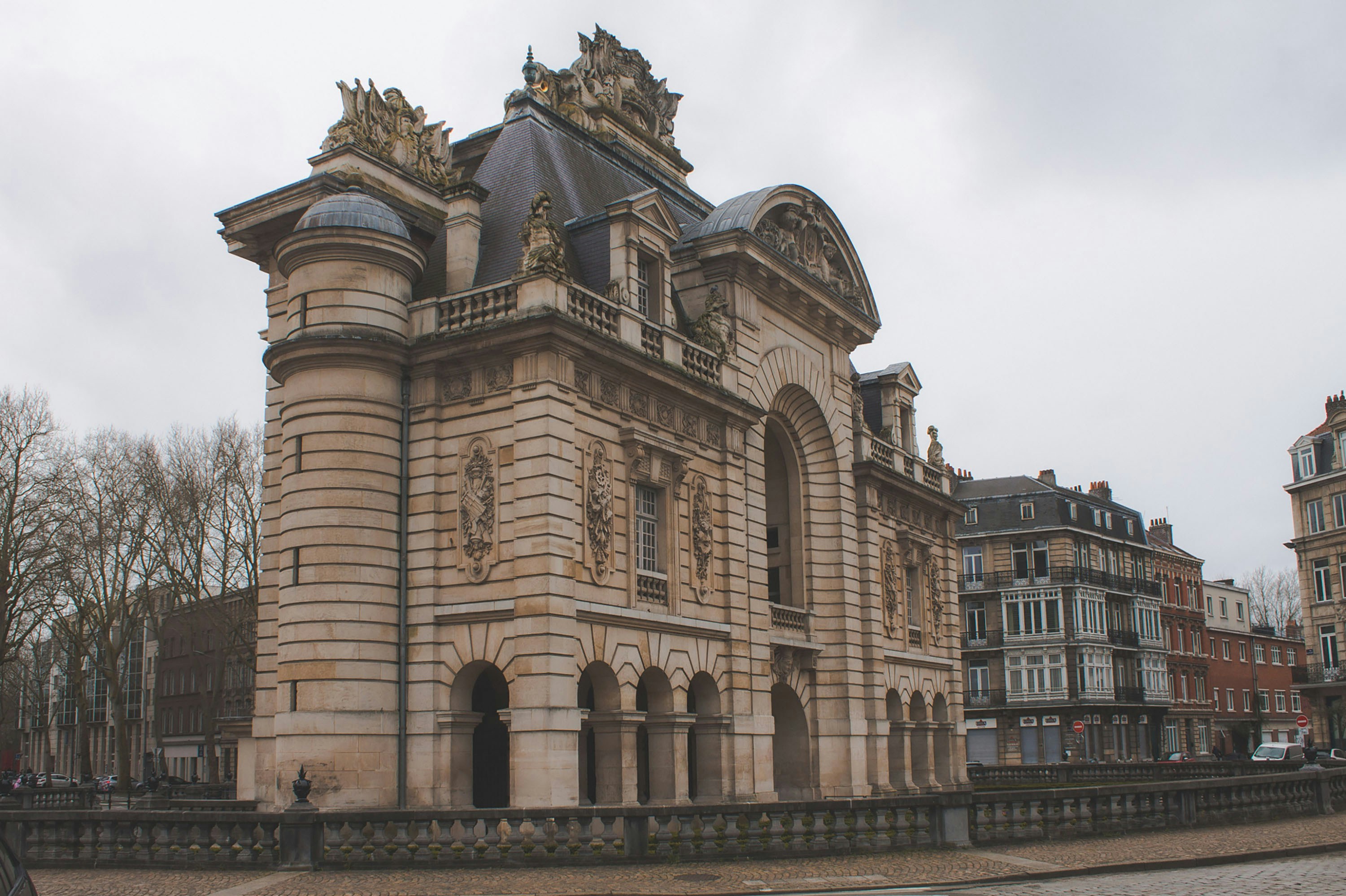 brown concrete building under white sky during daytime
