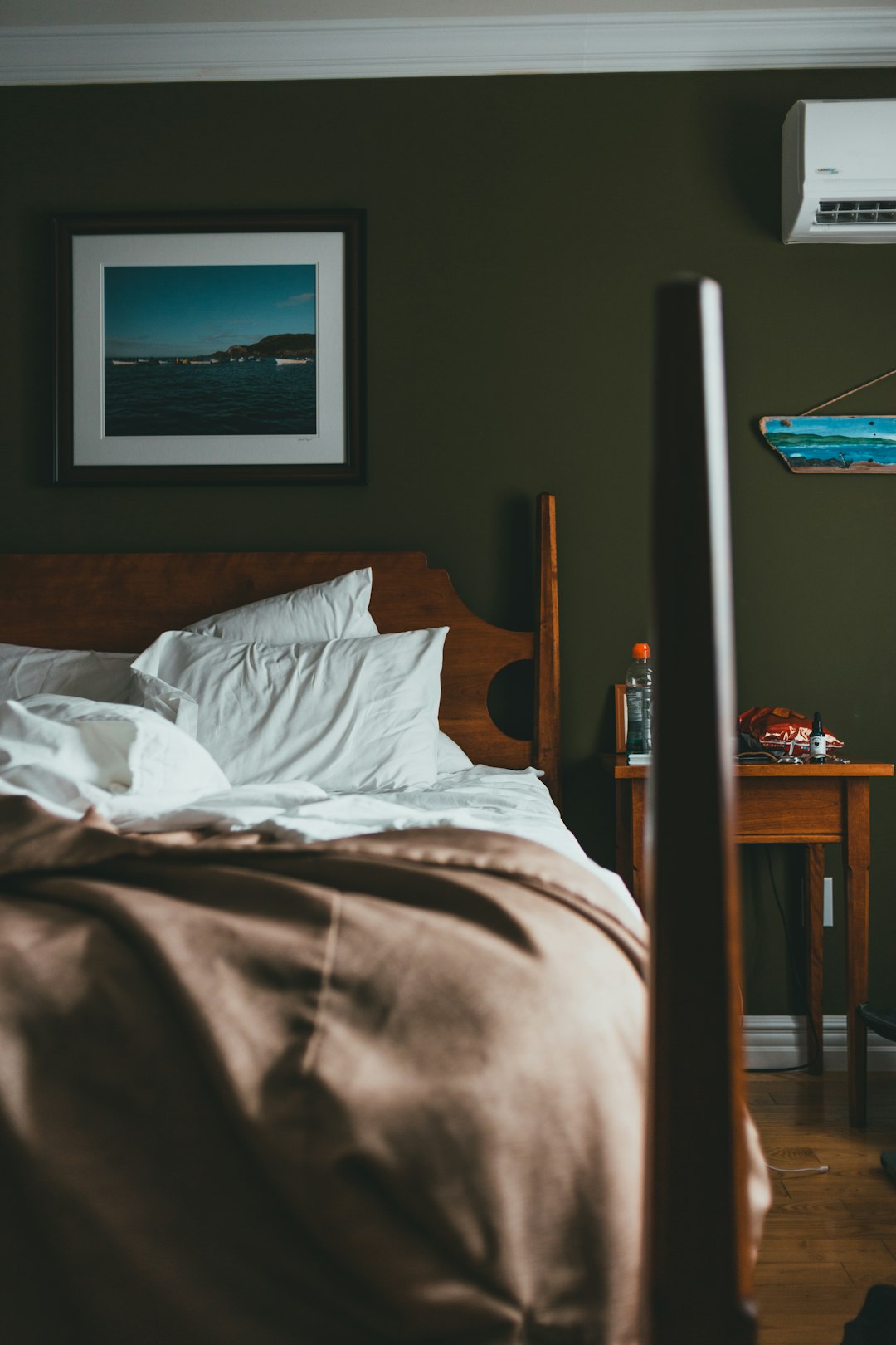 white bed pillow on bed