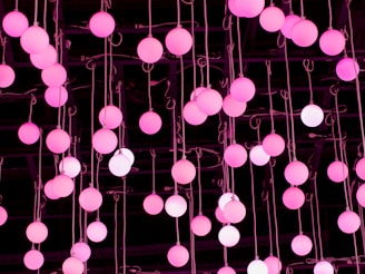 green and white balloons on white ceiling