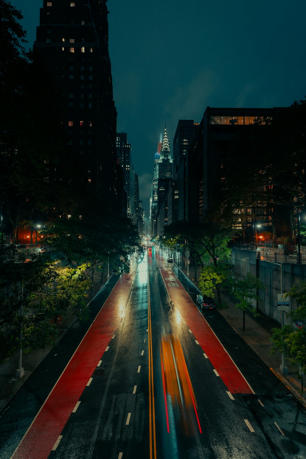 time lapse photography of cars on road during night time