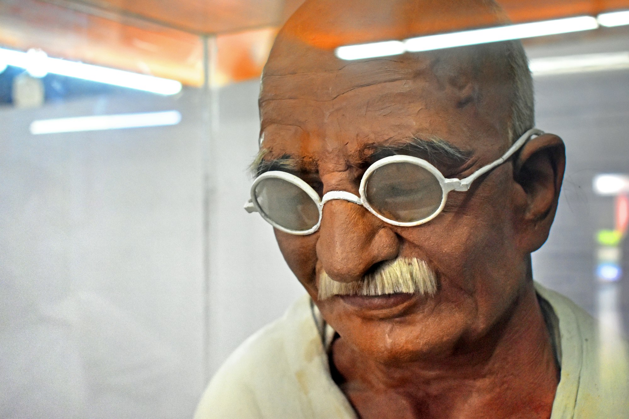 Close up of a life-like statue of Mahatma Gandhi, Sabarmati Ashram, Ahmedabad, Gujarat, India [Photo: August 2021]