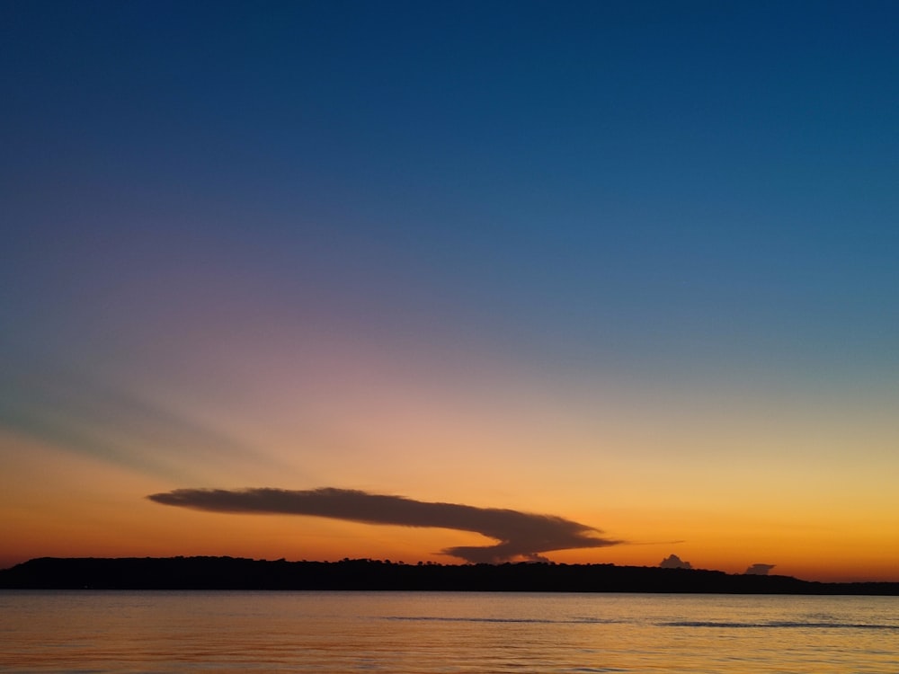 silhouette of mountain during sunset