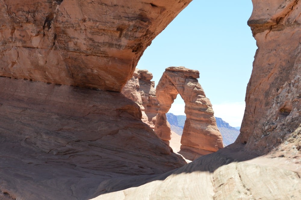 brown rock formation under blue sky during daytime