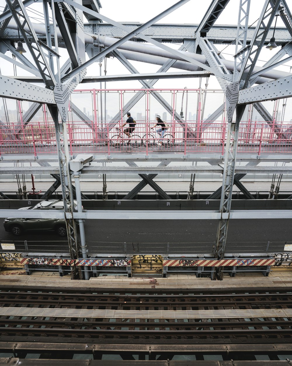 yellow and black train on track during daytime