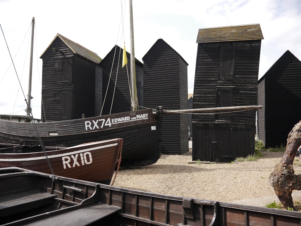 brown and black boat on dock during daytime