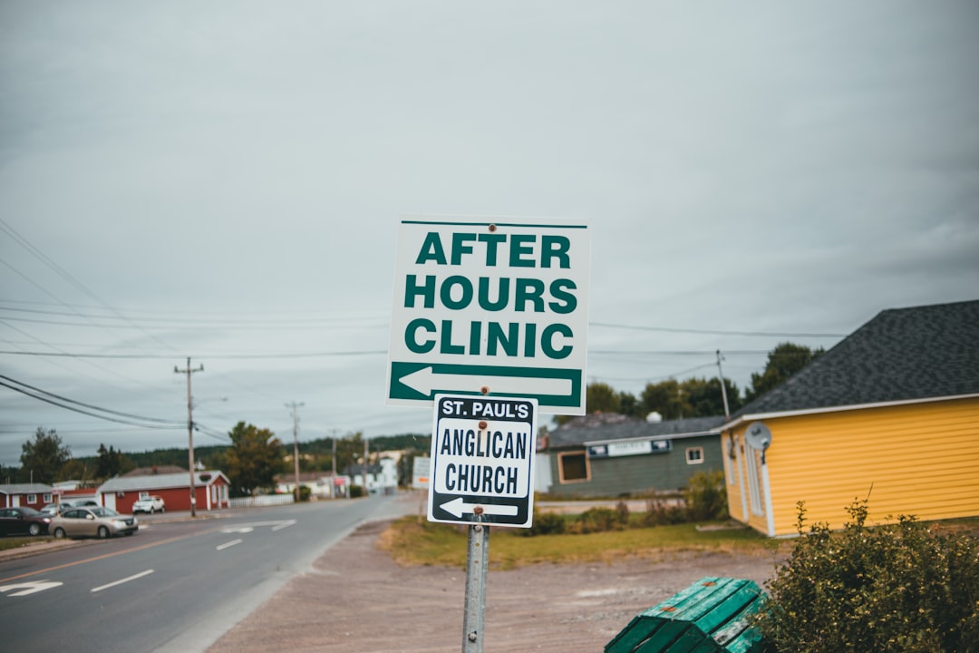 white and green street sign