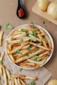 french fries on white ceramic plate