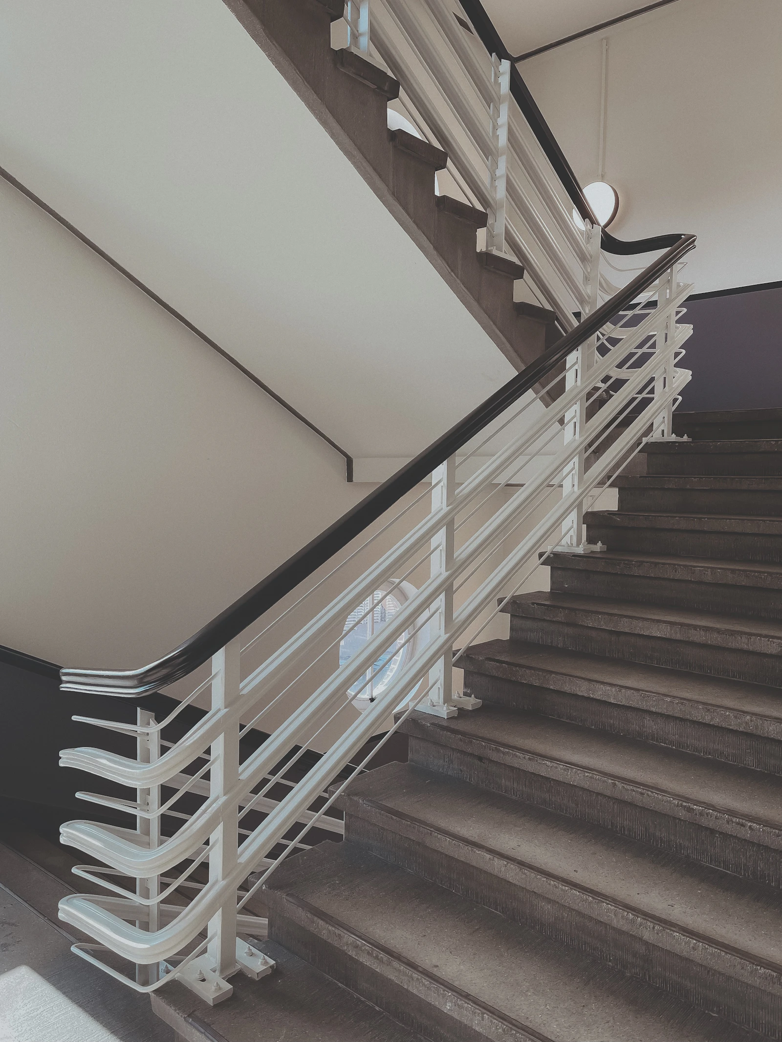 White and brown wooden staircase