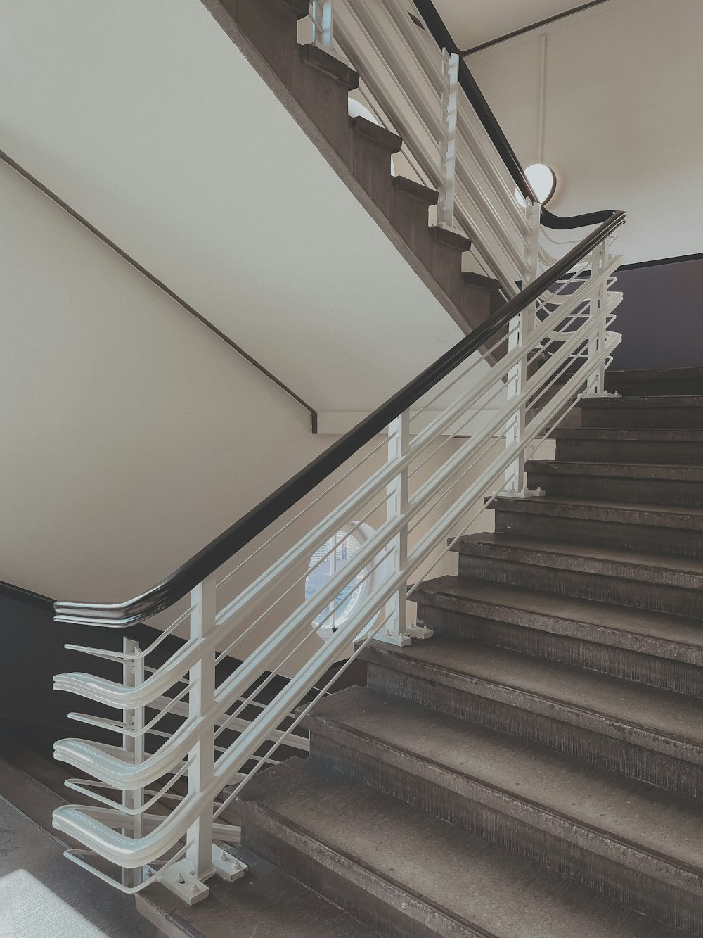 white and brown wooden staircase