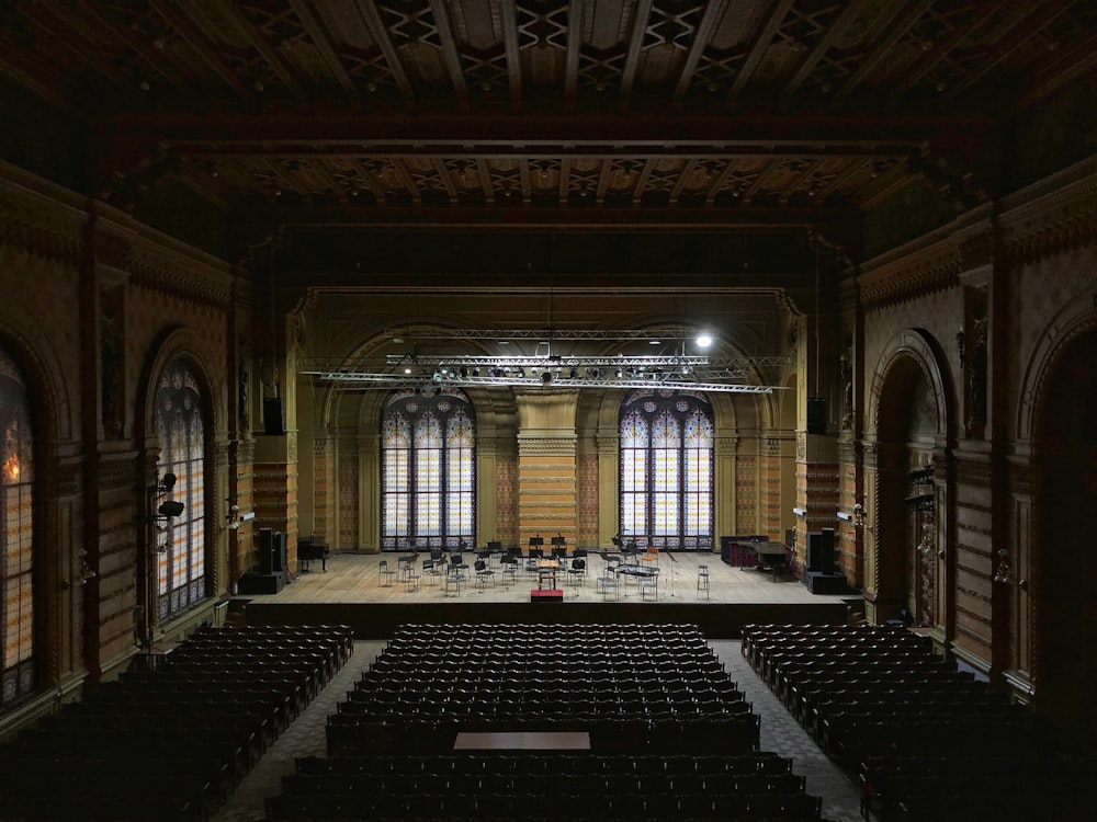 brown and black chairs inside building