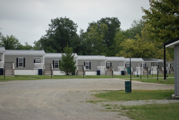 Mobile homes in a line with wood stairs
