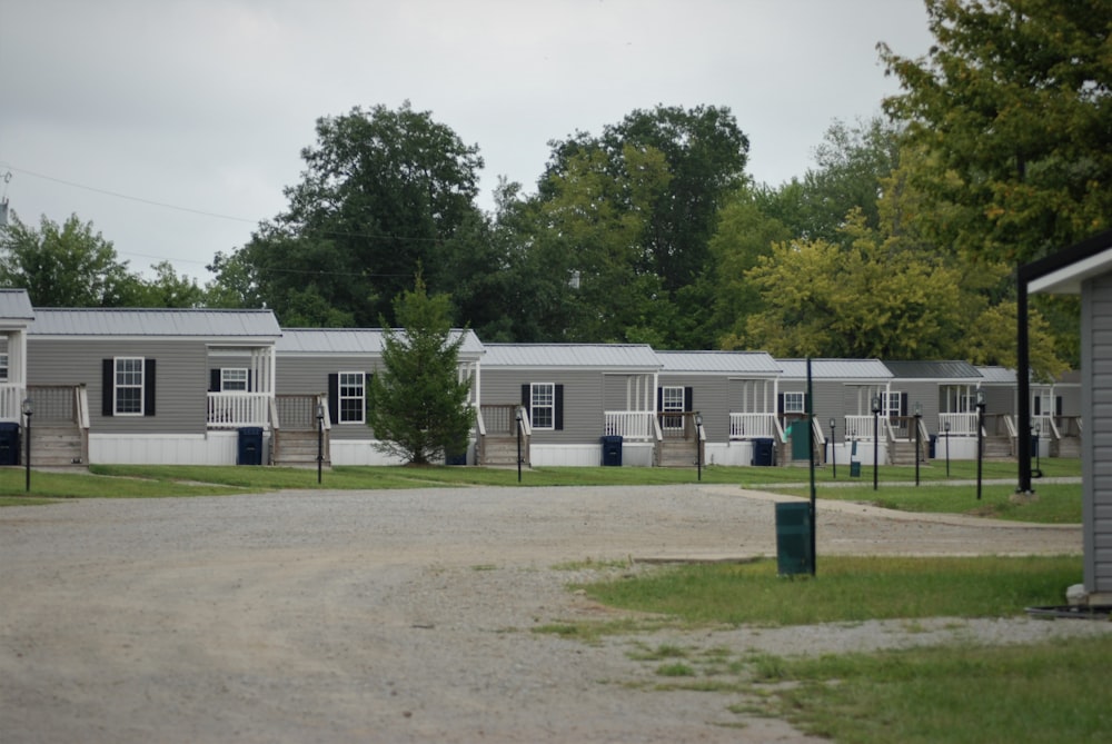 white concrete building near green trees during daytime