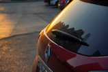 Evening shot of a Clearvista technician finishing a windshield repair under soft lighting.
