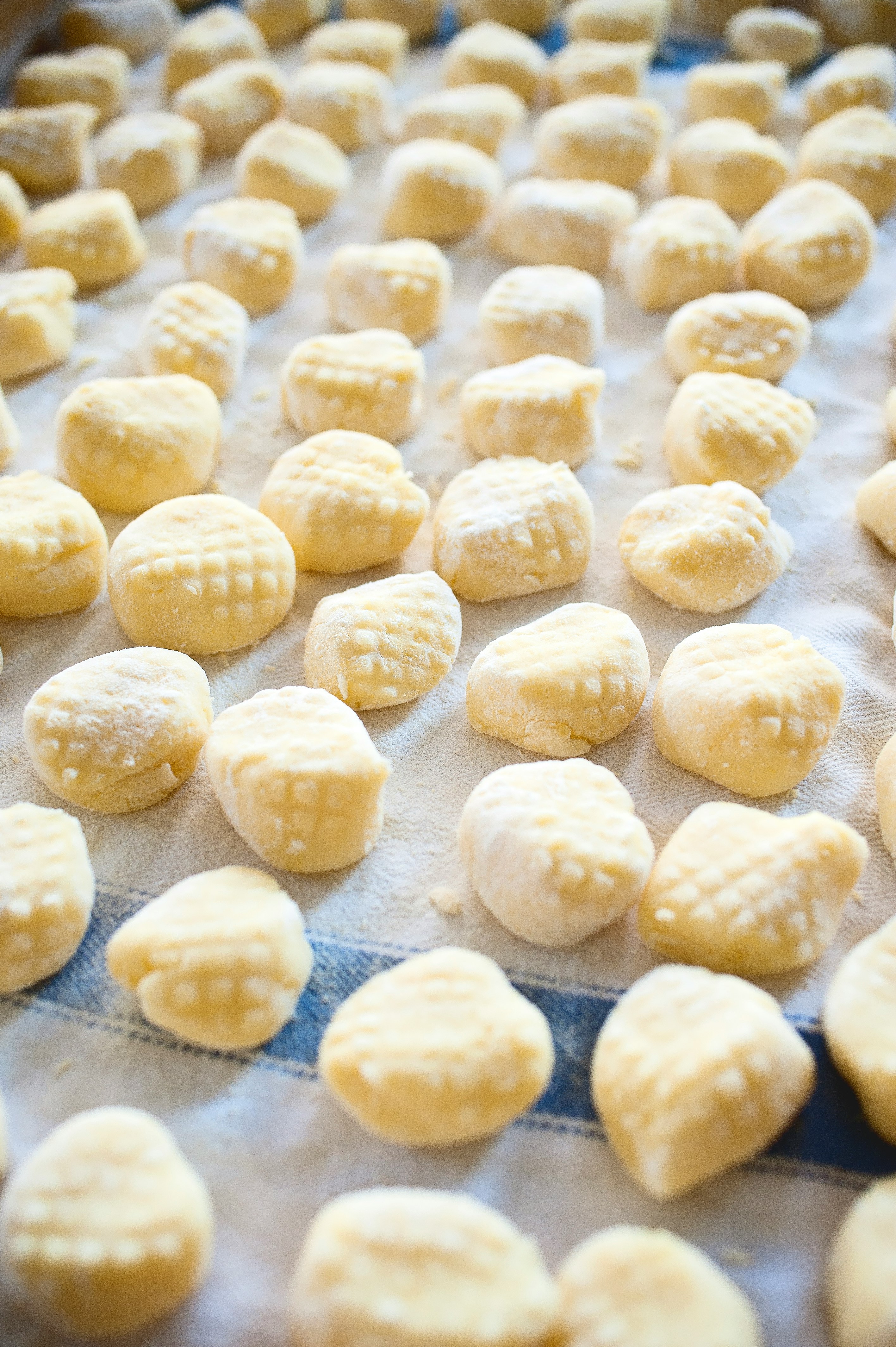 white round food on blue textile