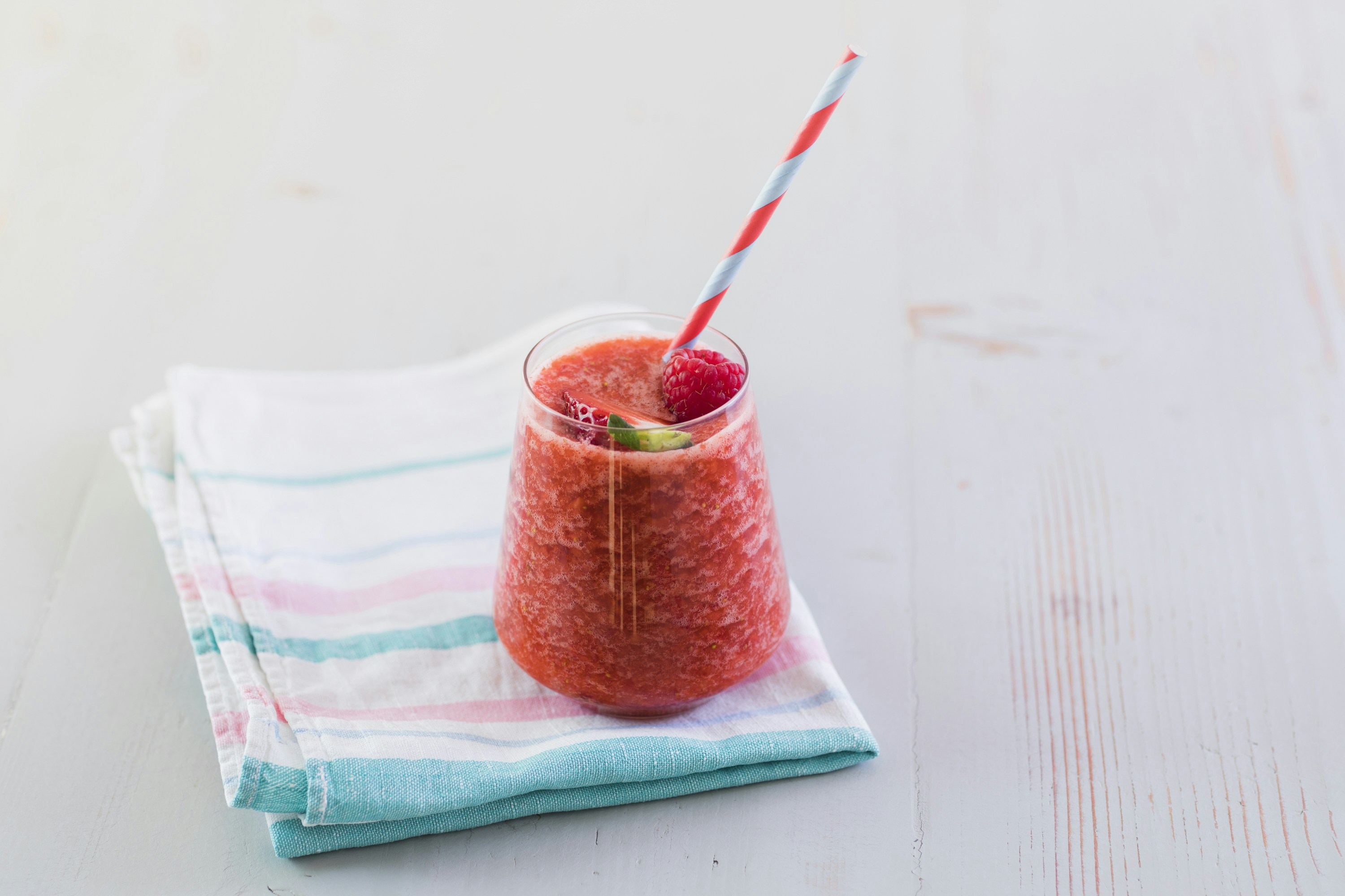 Strawberry smoothie on wood table