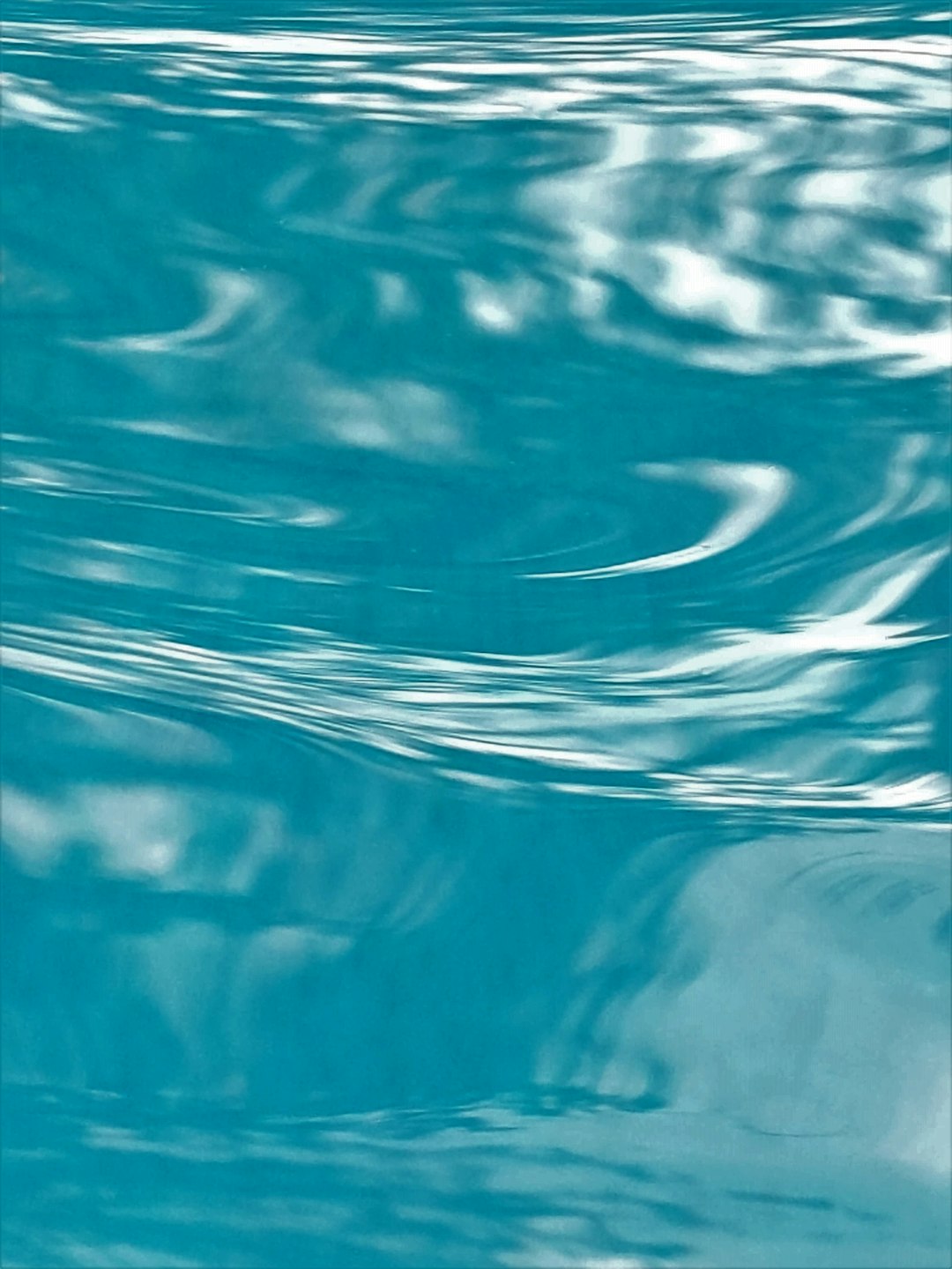 blue water wave in close up photography