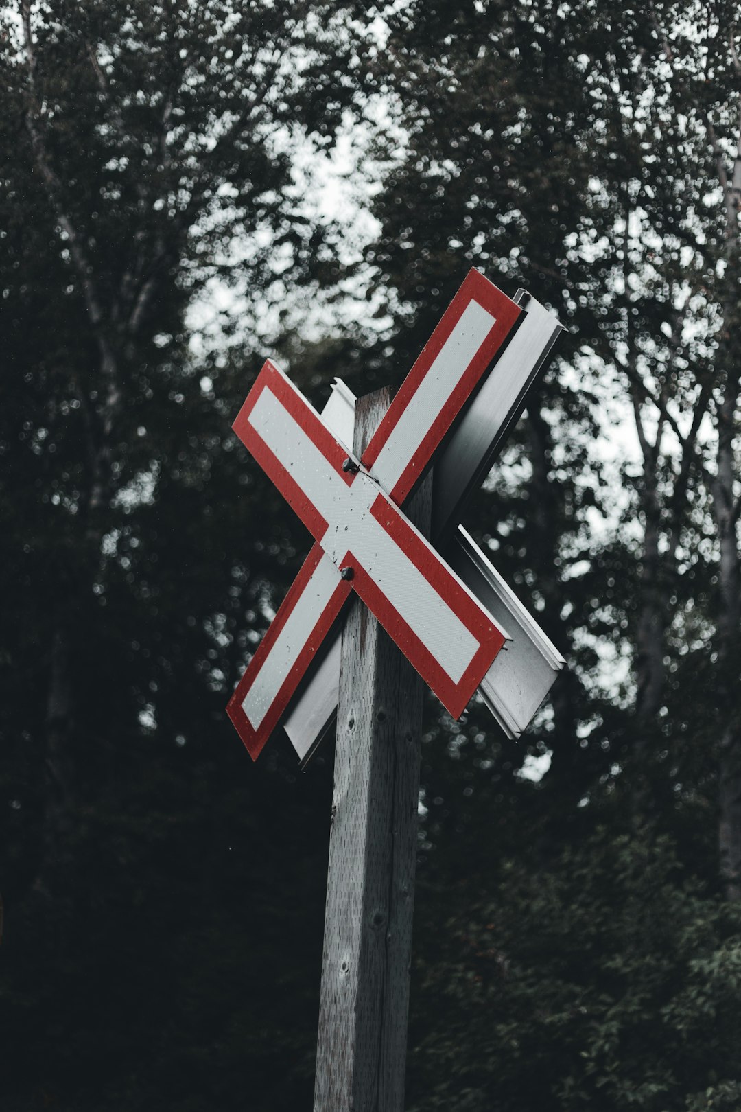 white and red cross signage