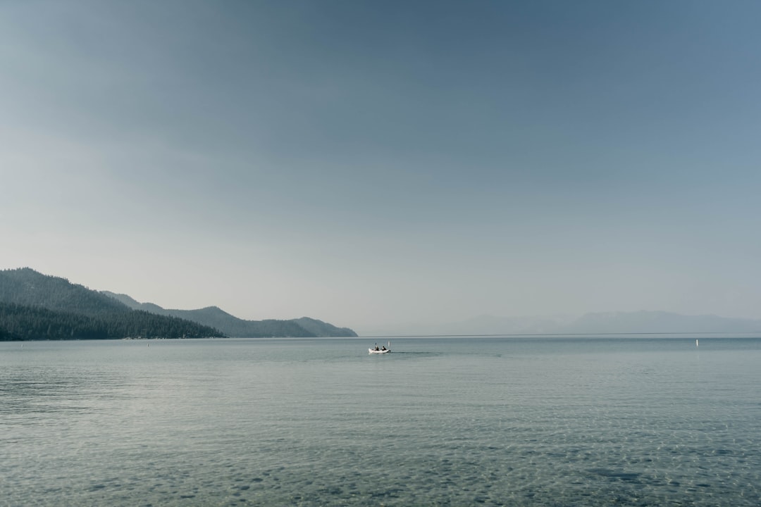 body of water under blue sky during daytime