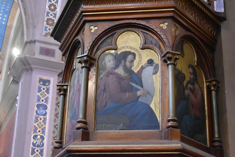 brown wooden framed jesus christ painting