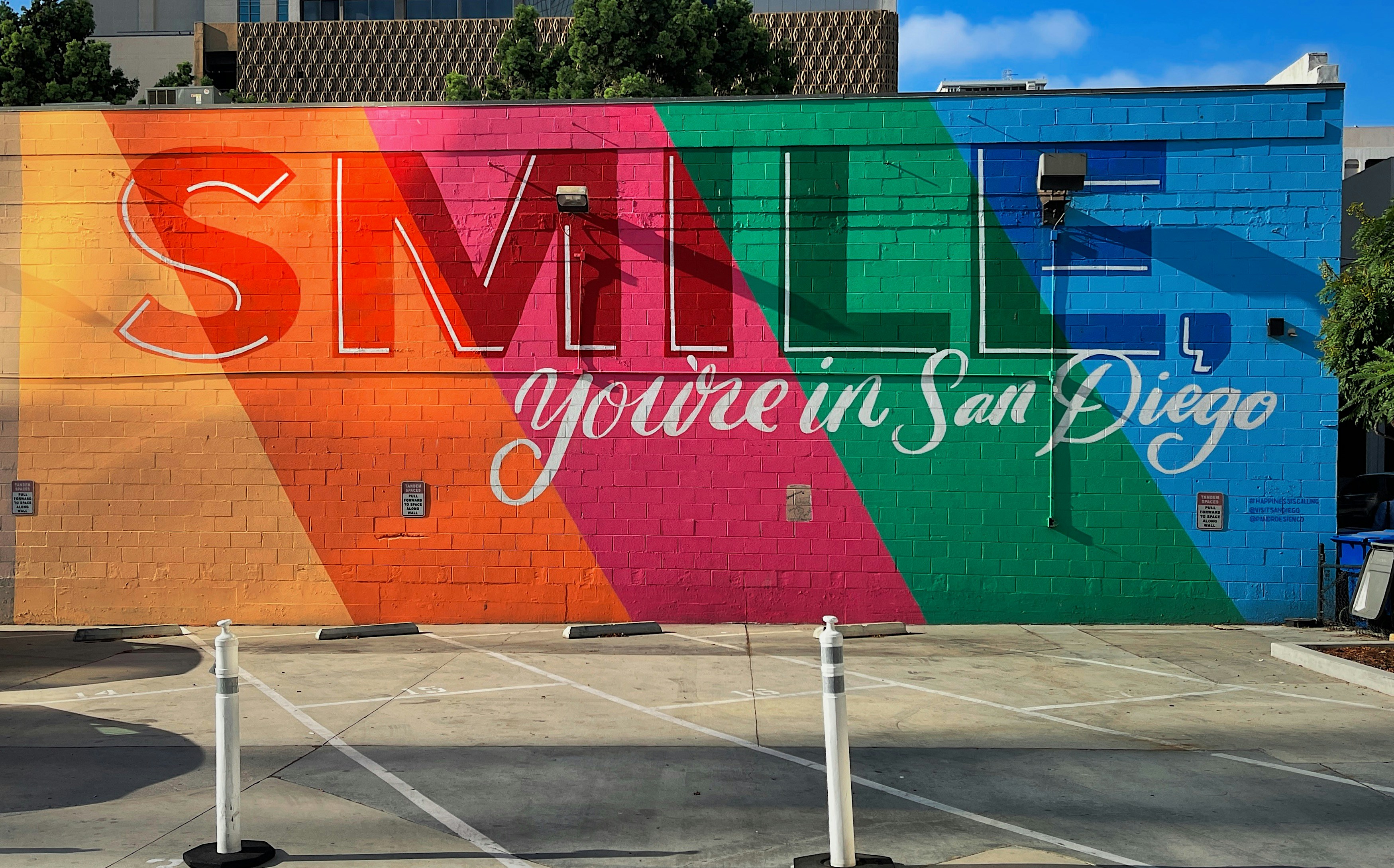 A colorful mural on the side of a building photo – Free Image on Unsplash