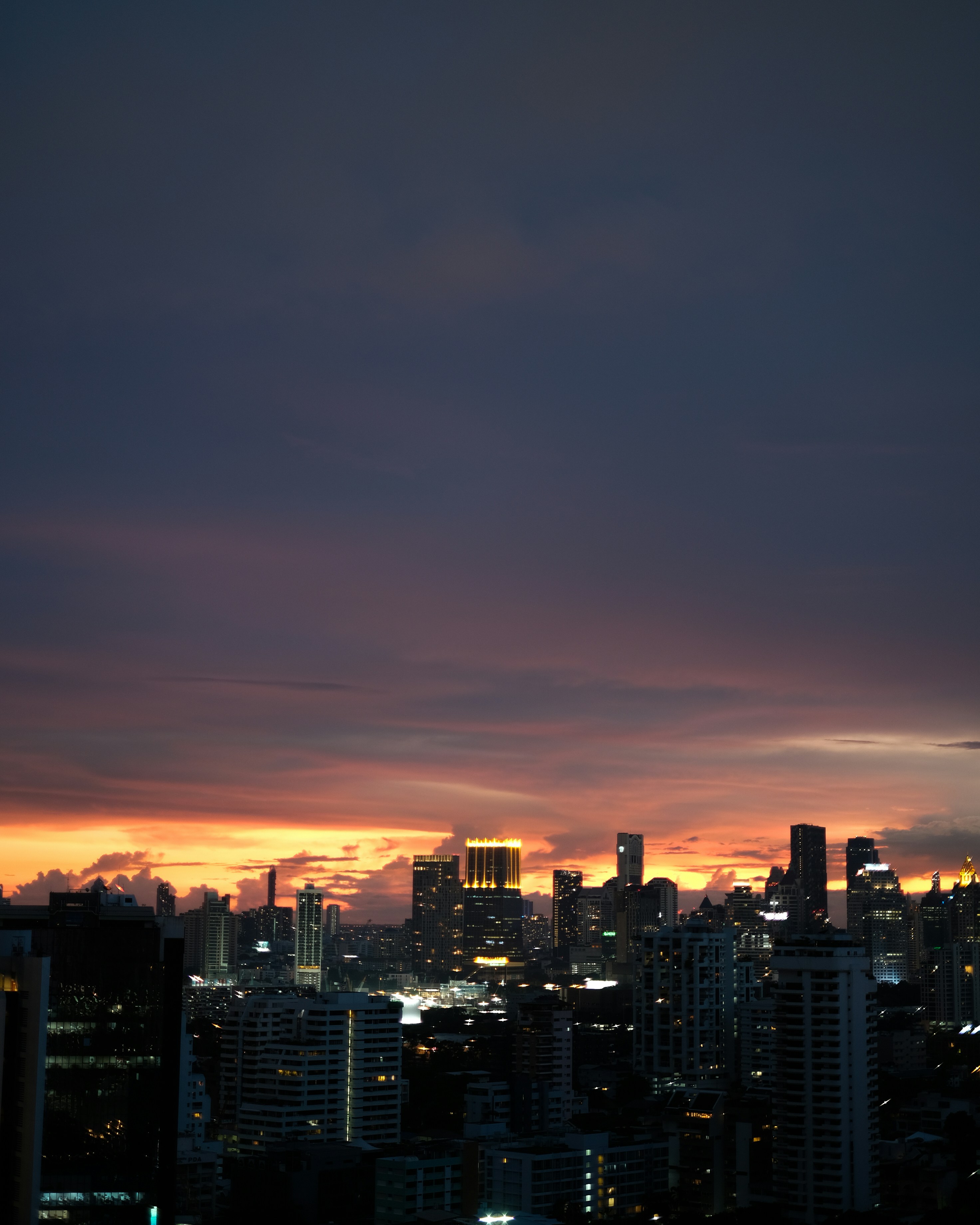 city skyline during night time