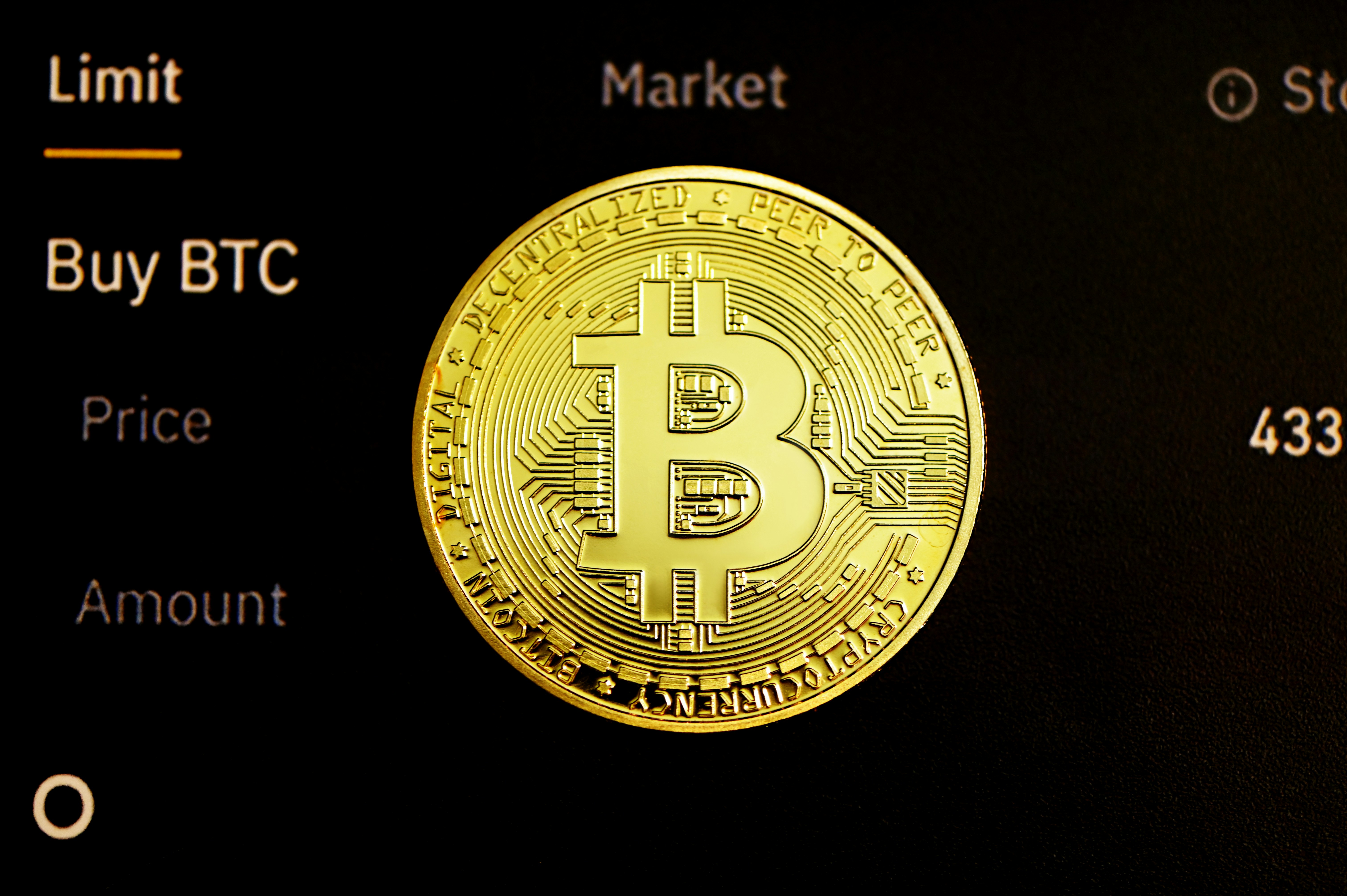 A Bitcoin on top of a trading site