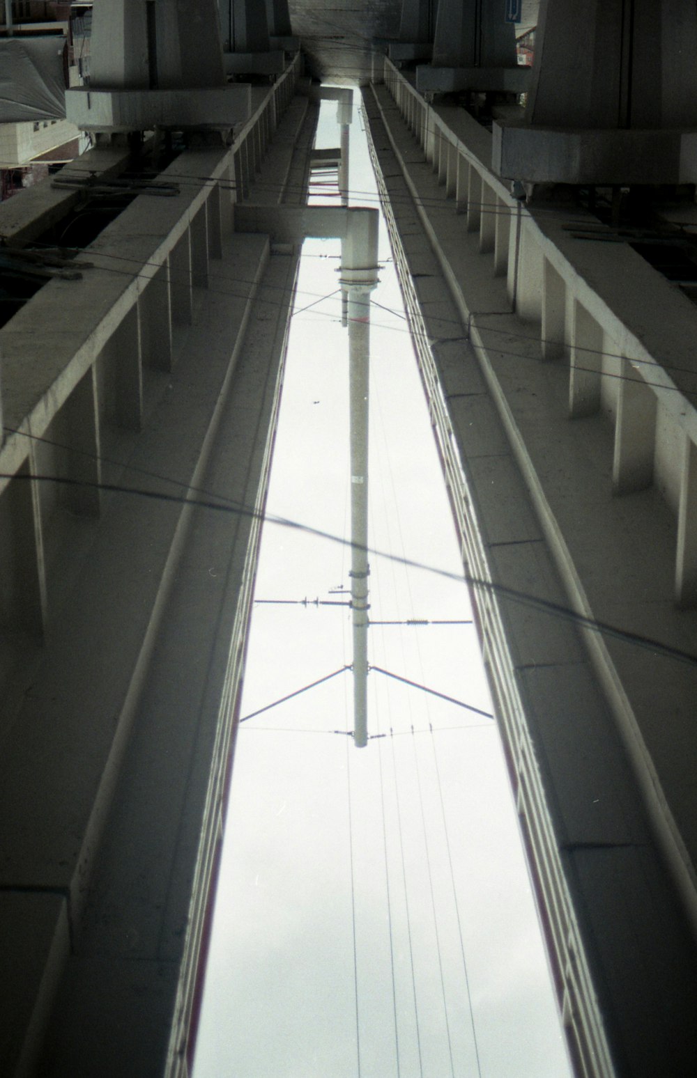 white metal railings on white concrete building