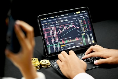person using black tablet computer