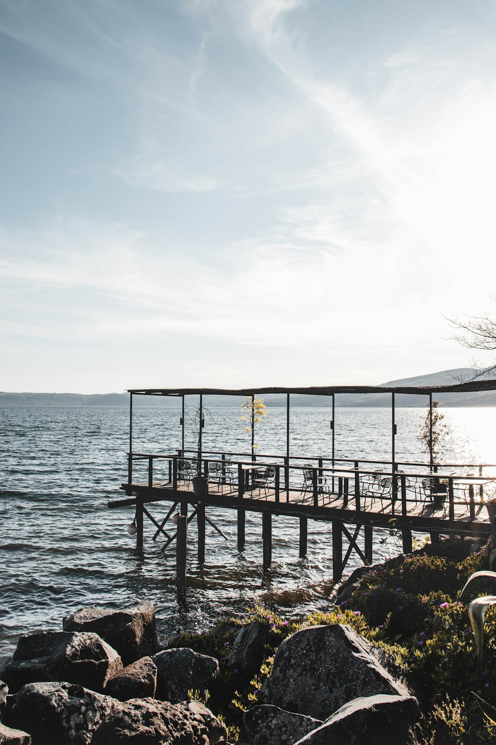 brown wooden dock on sea during daytime