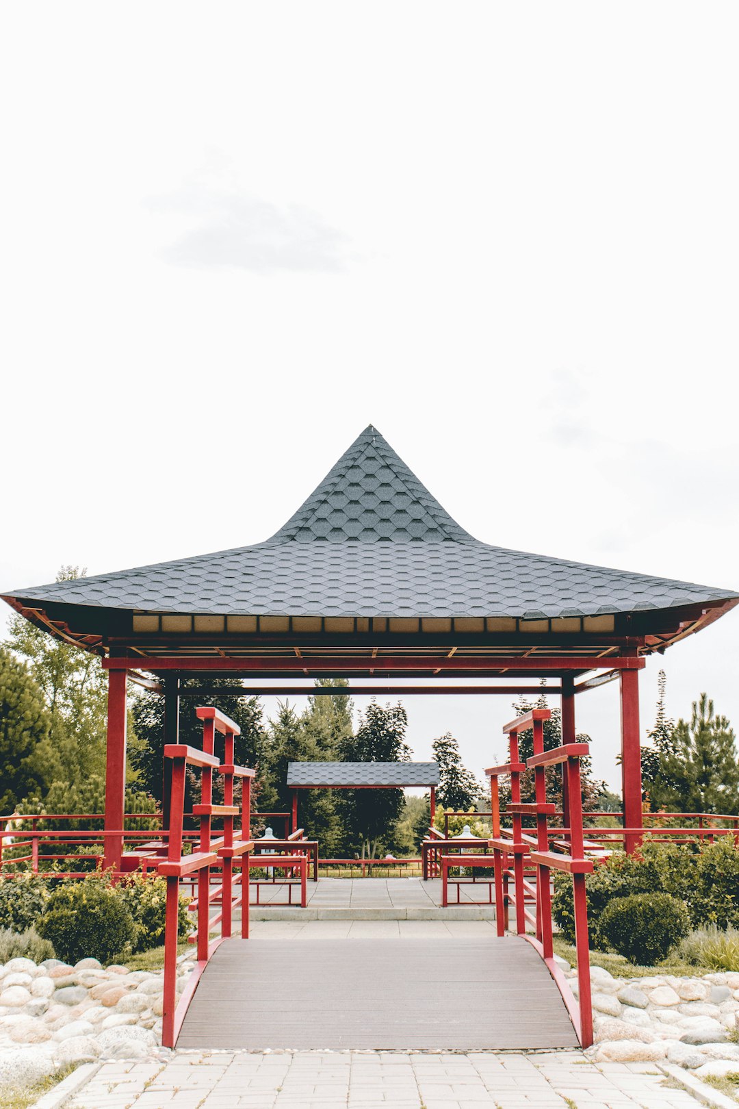 red and black wooden gazebo