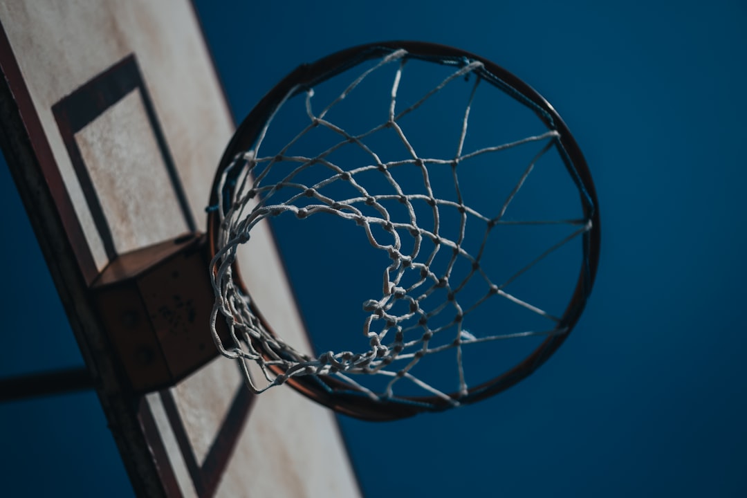 basketball hoop under blue sky during daytime