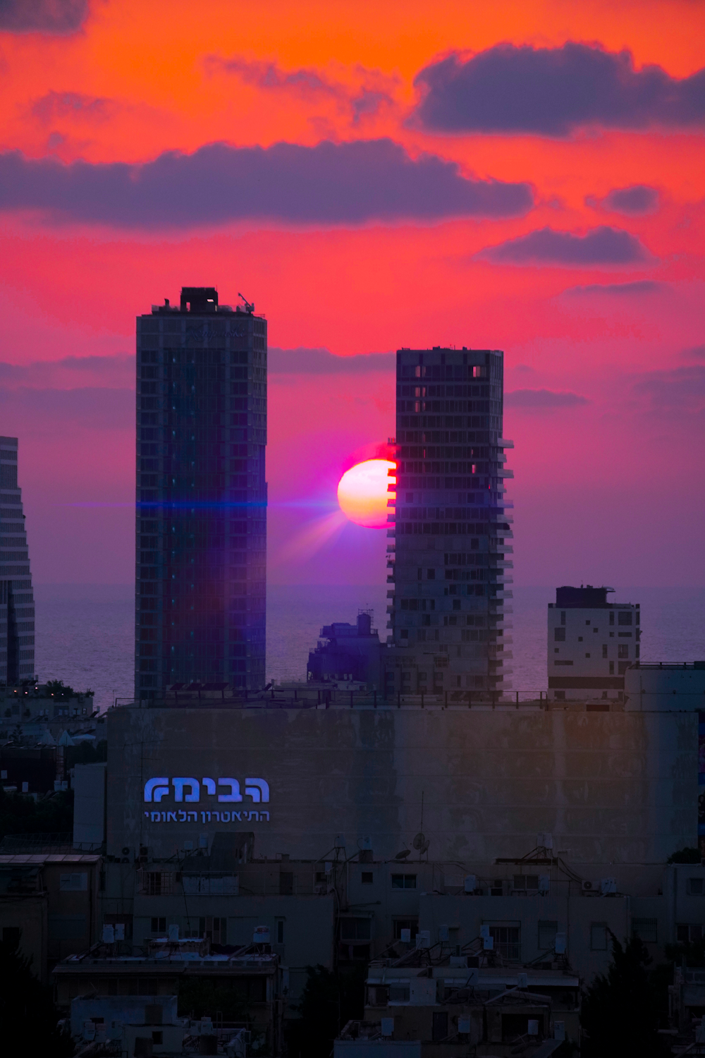 city skyline during night time