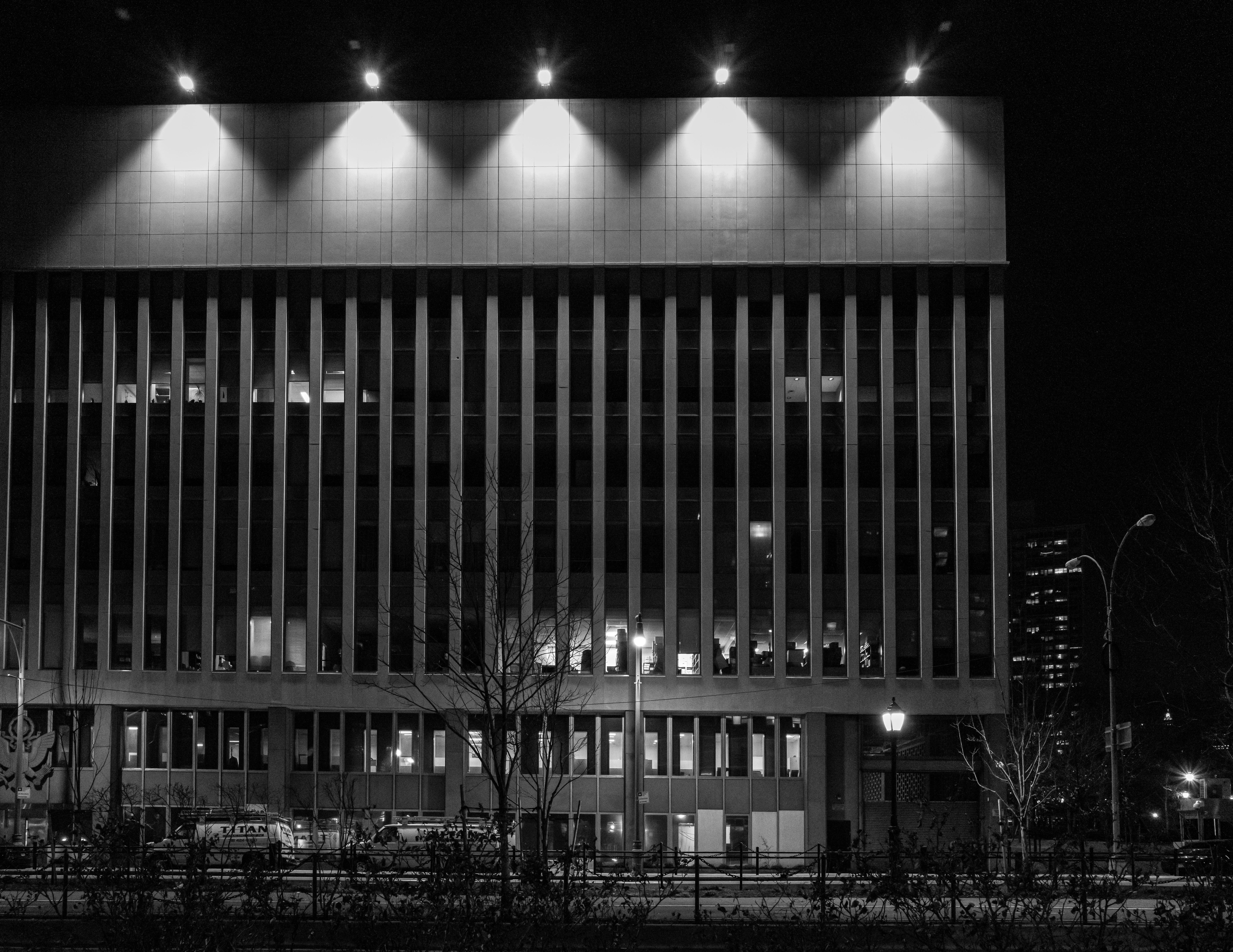 grayscale photo of building during night time