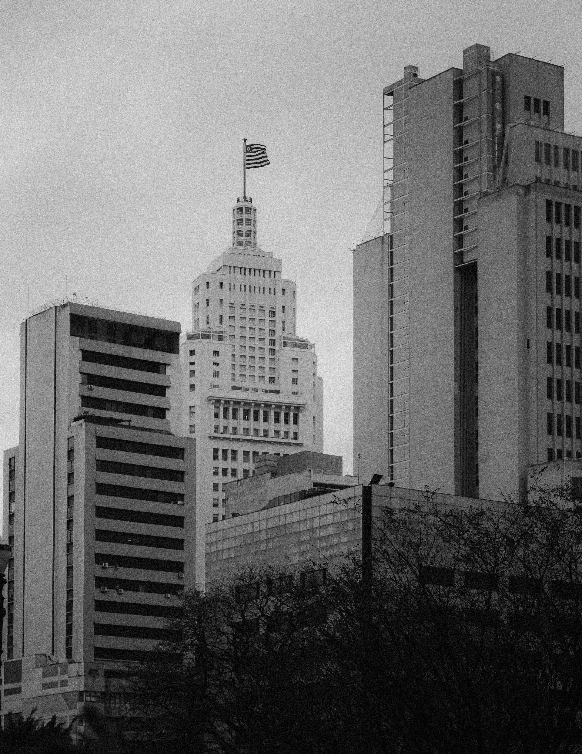 grayscale photo of high rise building
