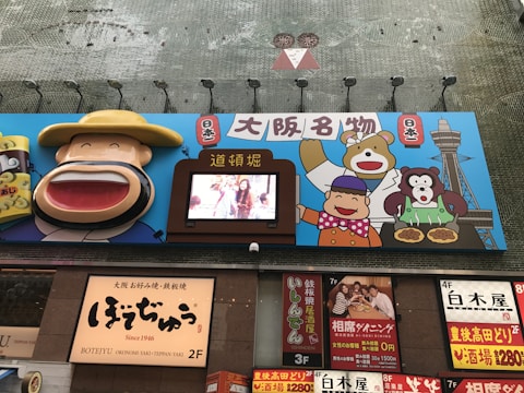 A vibrant digital signage setup at an Okinawa event.