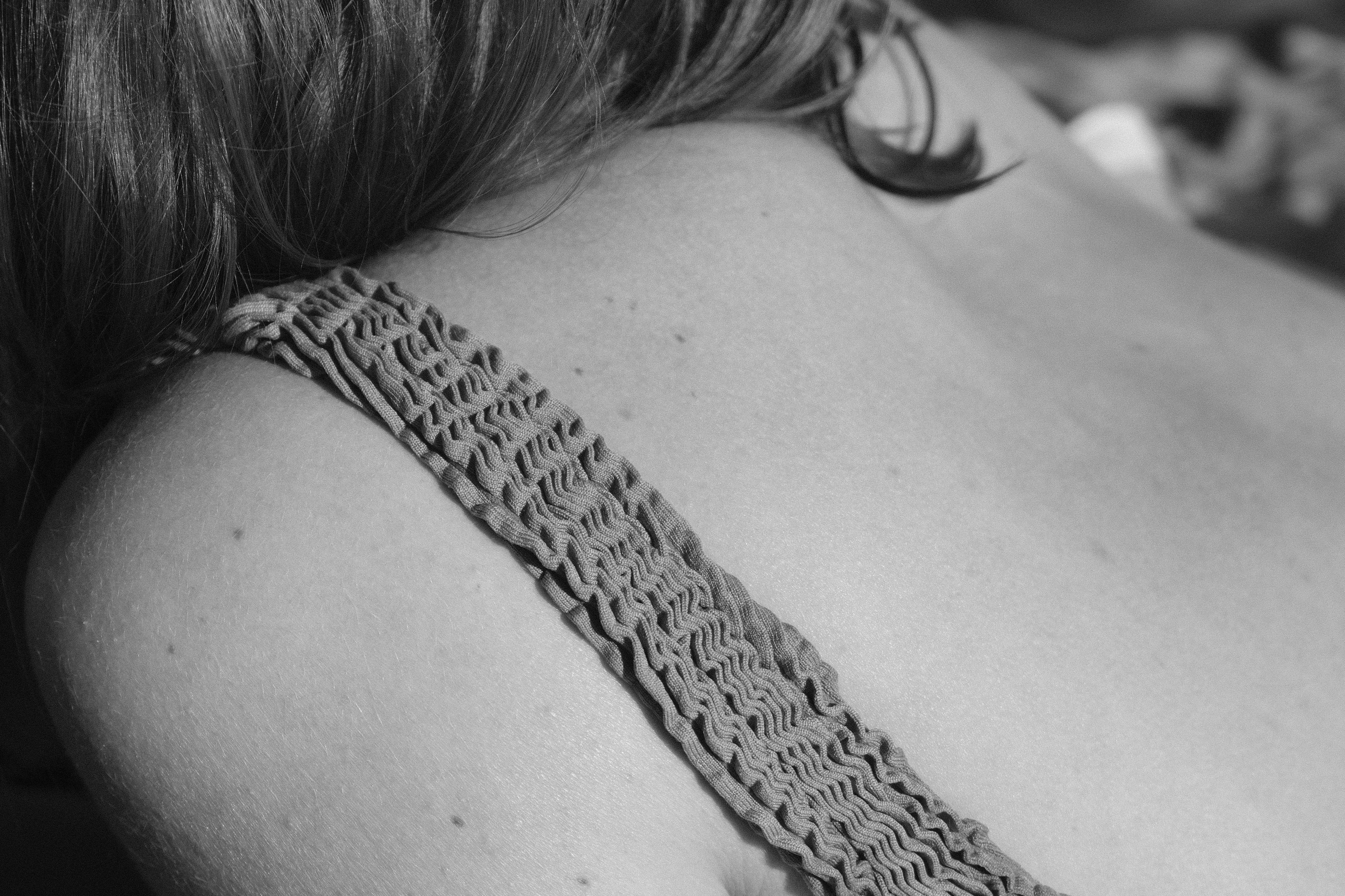 woman wearing silver chain necklace