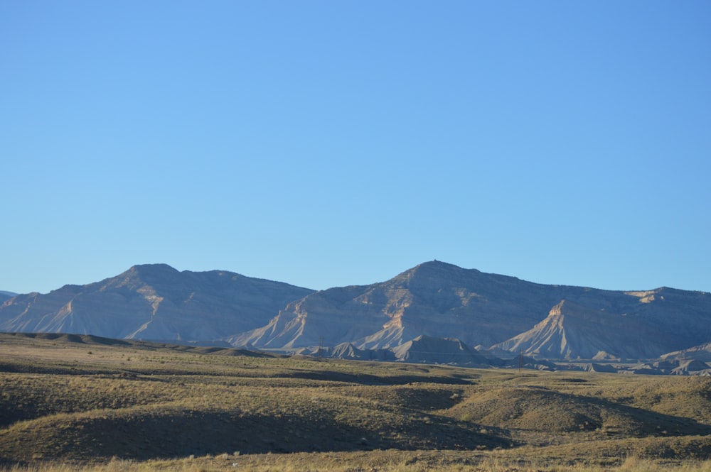 brown and gray mountains under blue sky during daytime