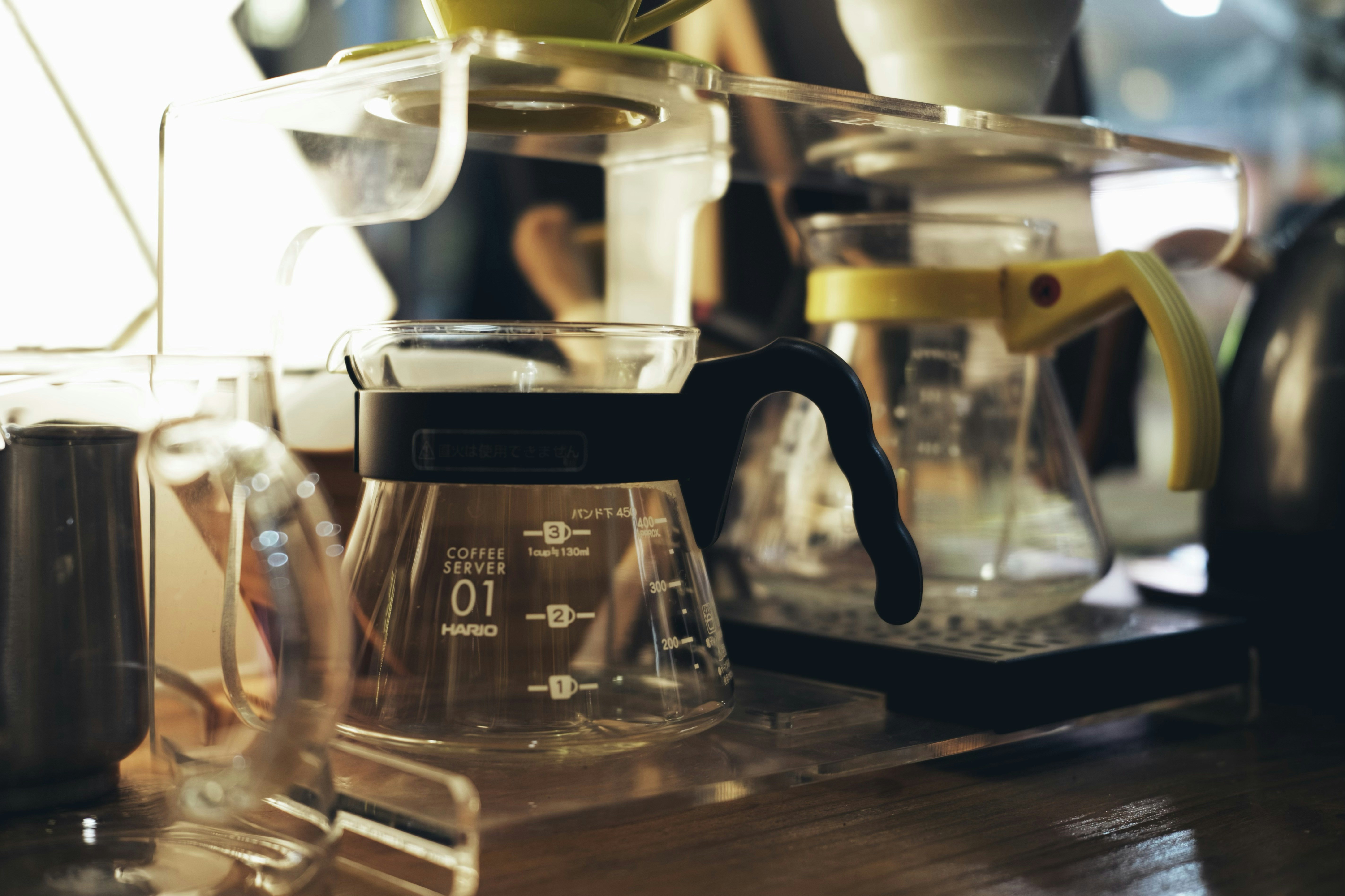 clear glass container on table