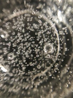 An exciting moment capturing a chain reaction of bubbles bursting.