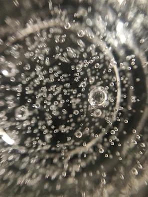 An exciting moment capturing a chain reaction of bubbles bursting.