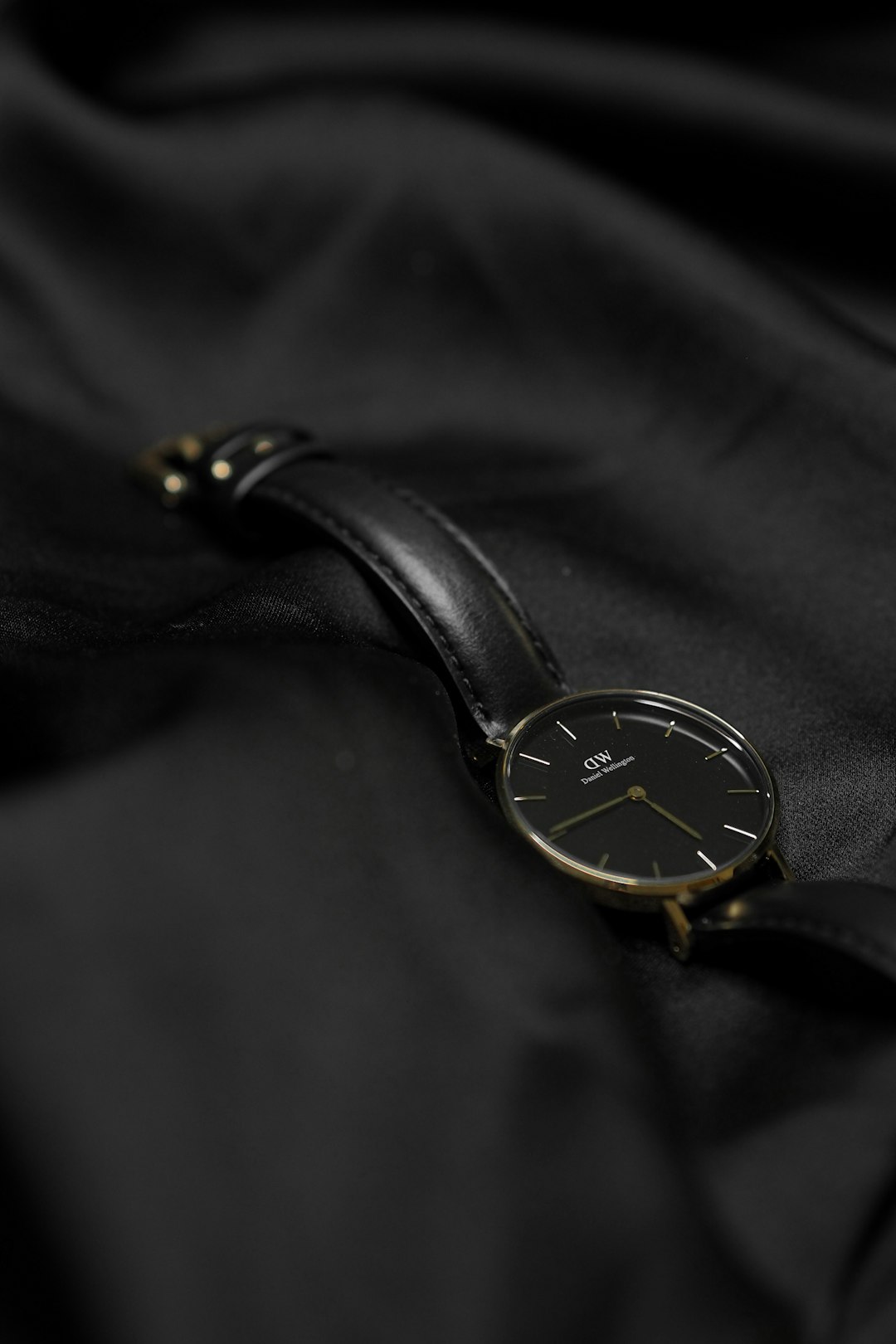 black leather strap gold round analog watch