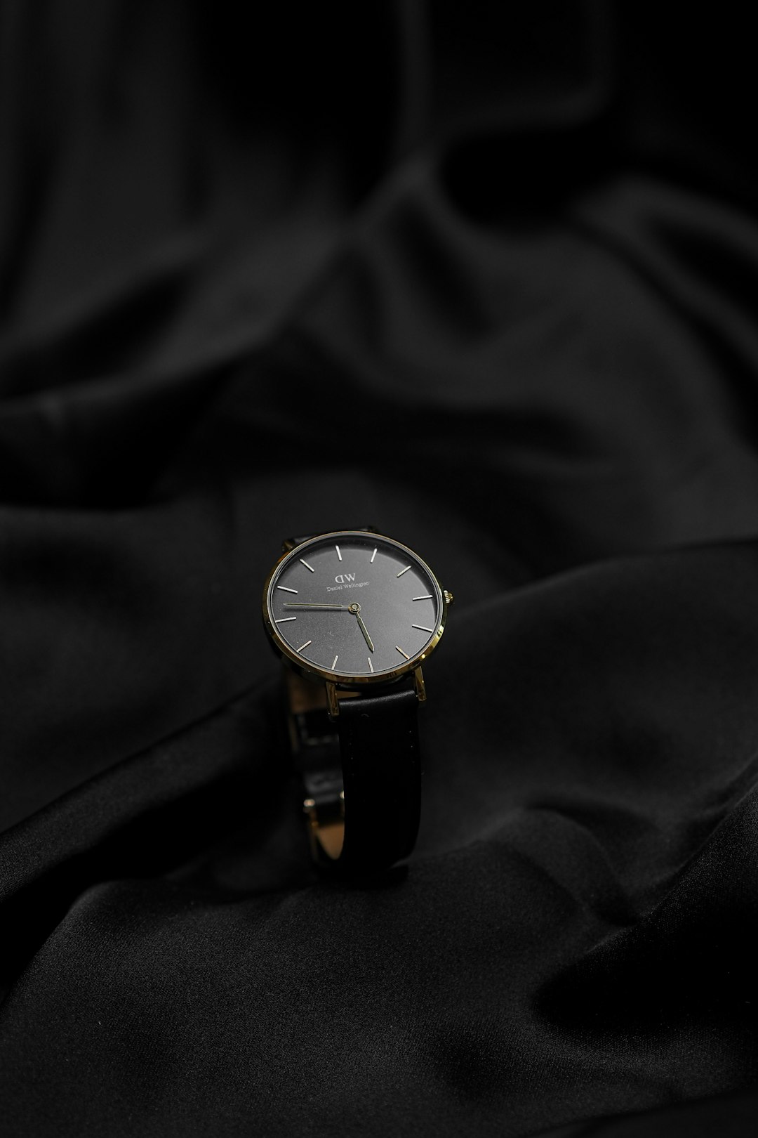 gold and silver analog watch