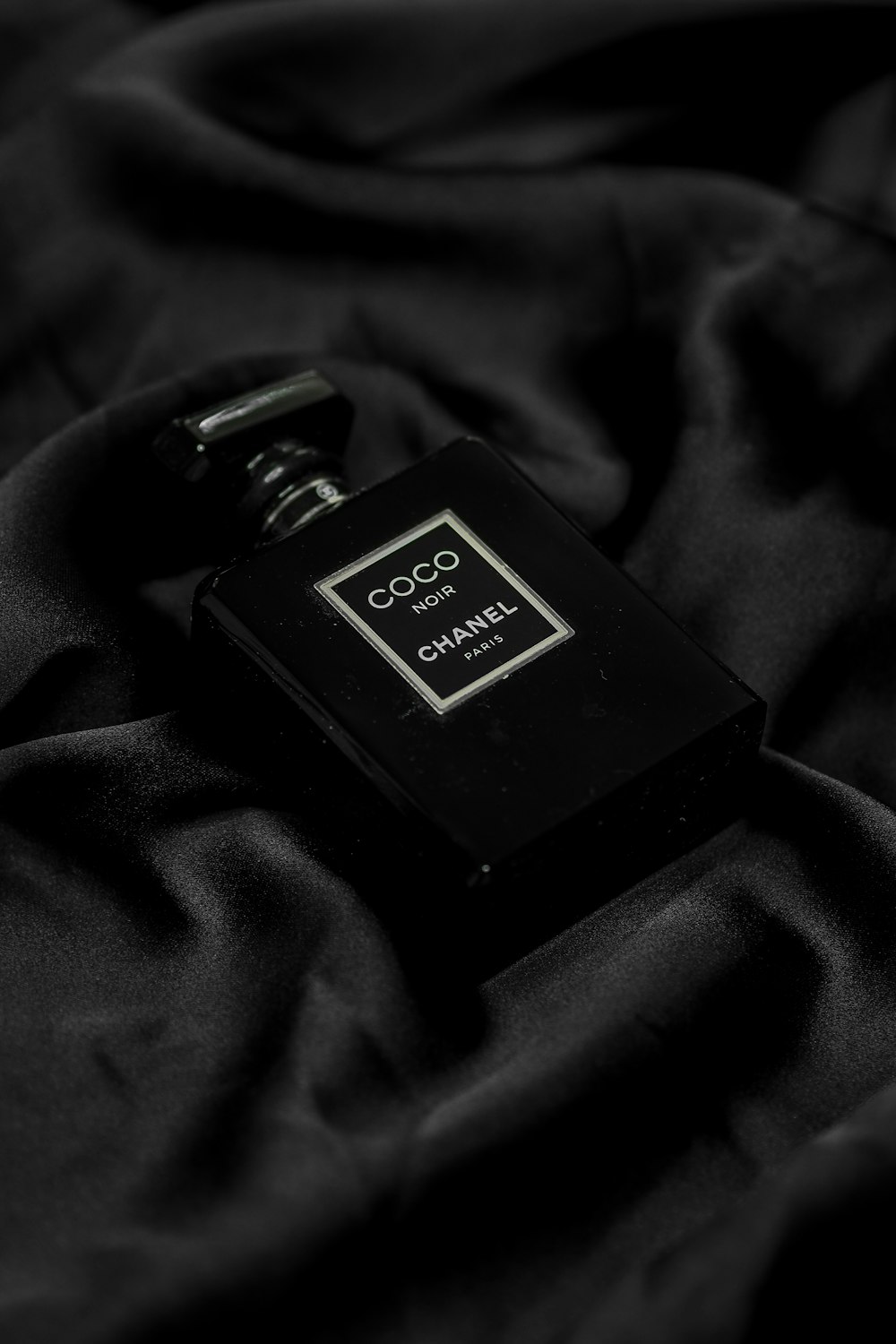black and gold perfume bottle
