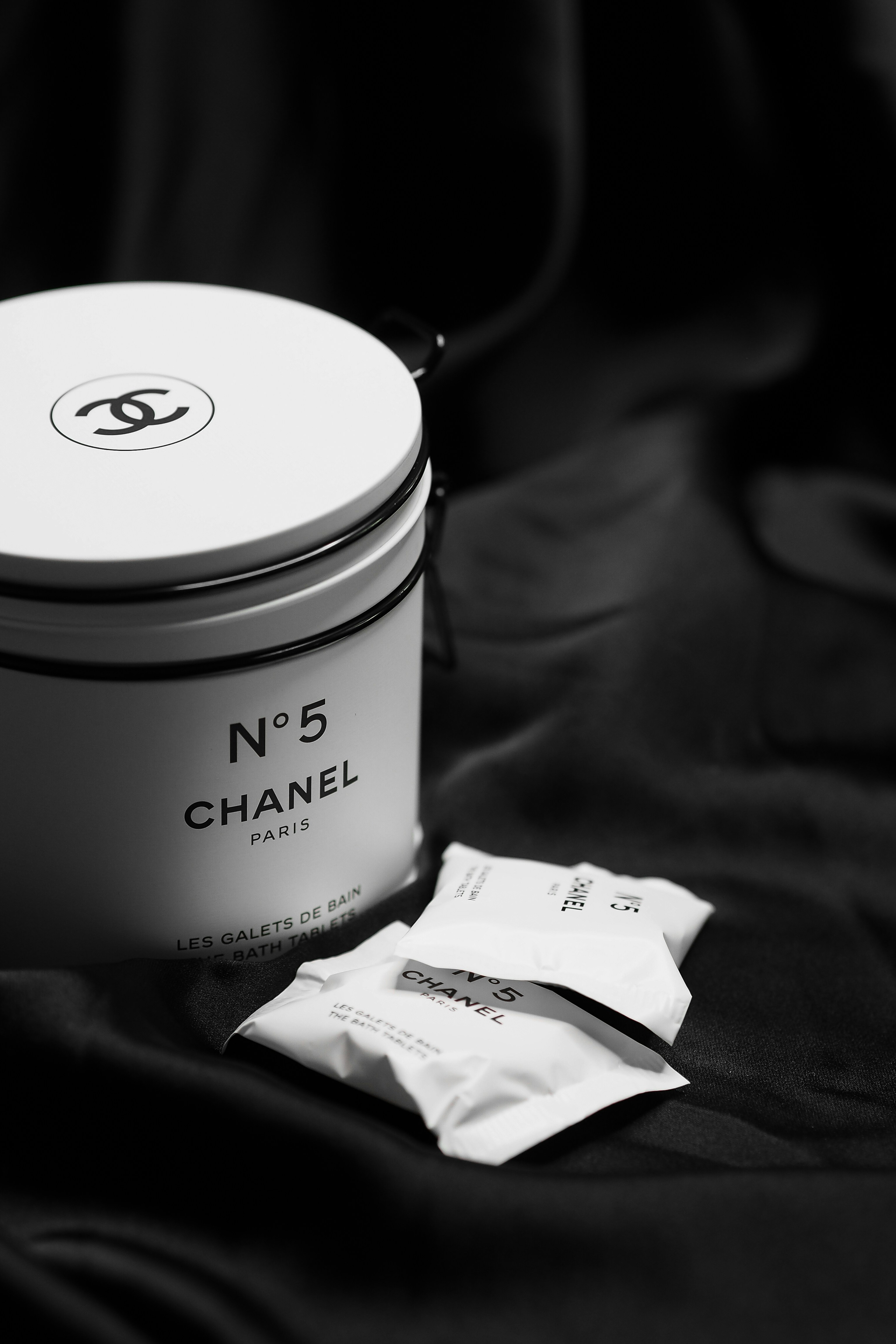 white and black plastic cup