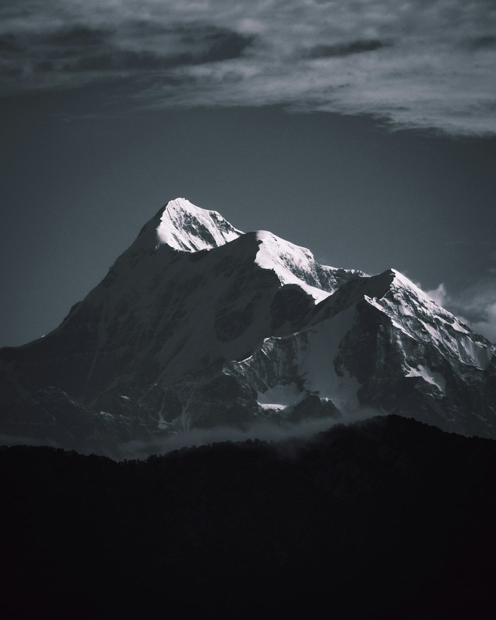 snow covered mountain during daytime