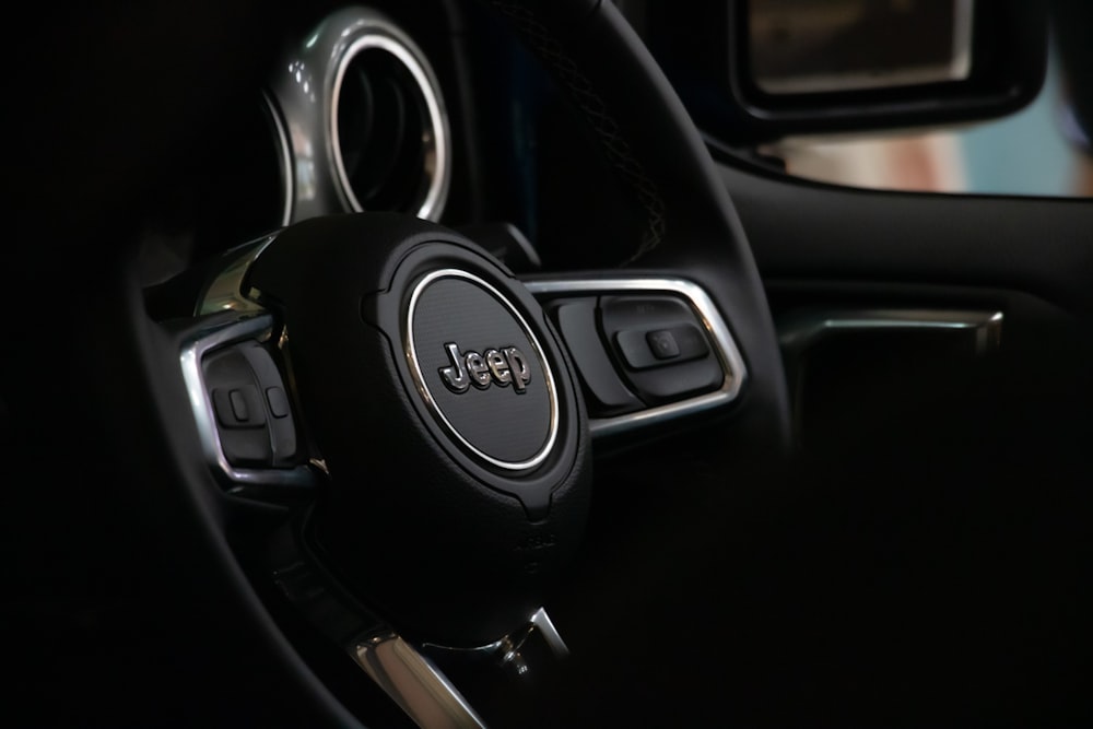 black and silver honda steering wheel