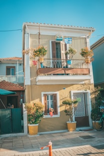 white and brown concrete house