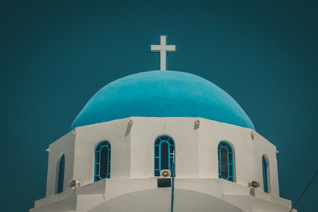 white and blue concrete church