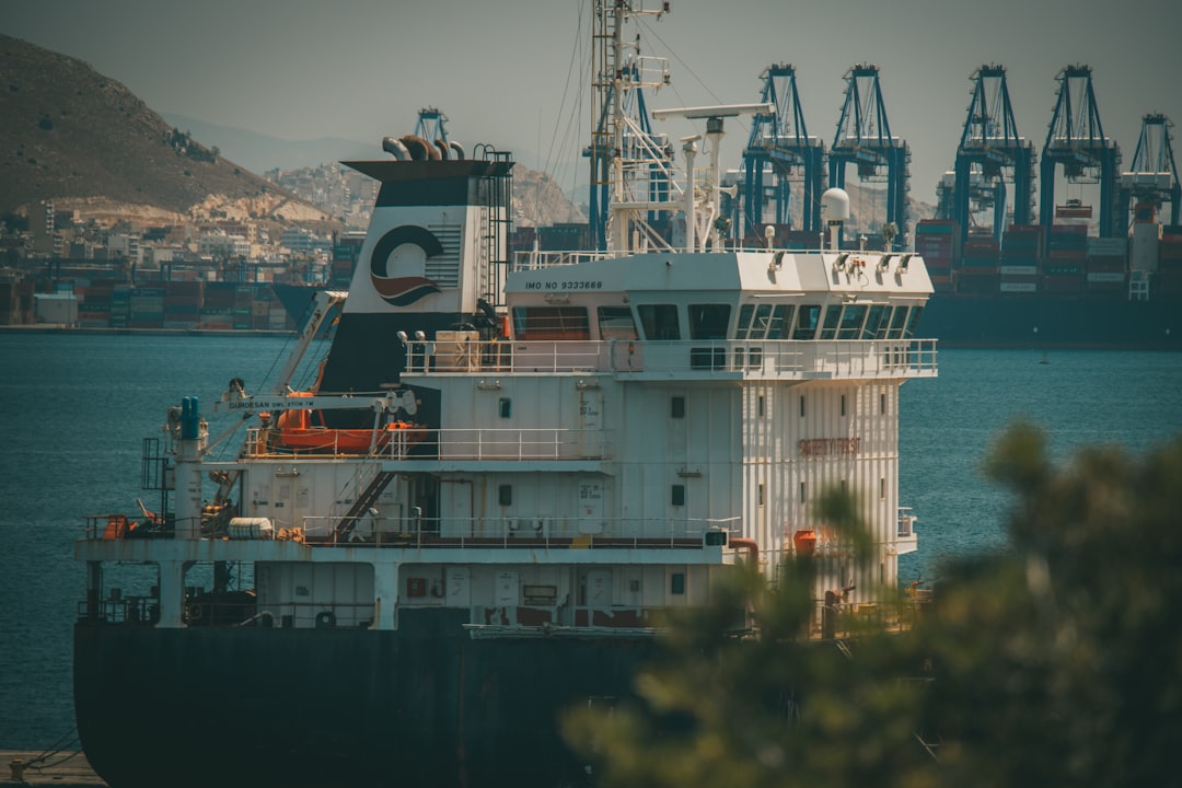 white and black ship on sea during daytime