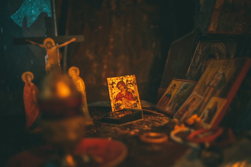 gold buddha figurine on table